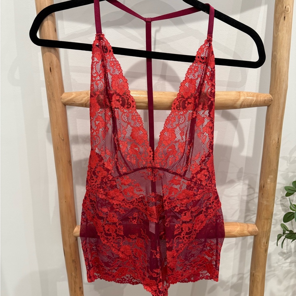 Free People Elegant Lace Bodysuit in red